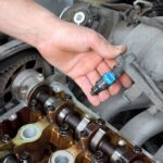A person indicating fuel injector problems